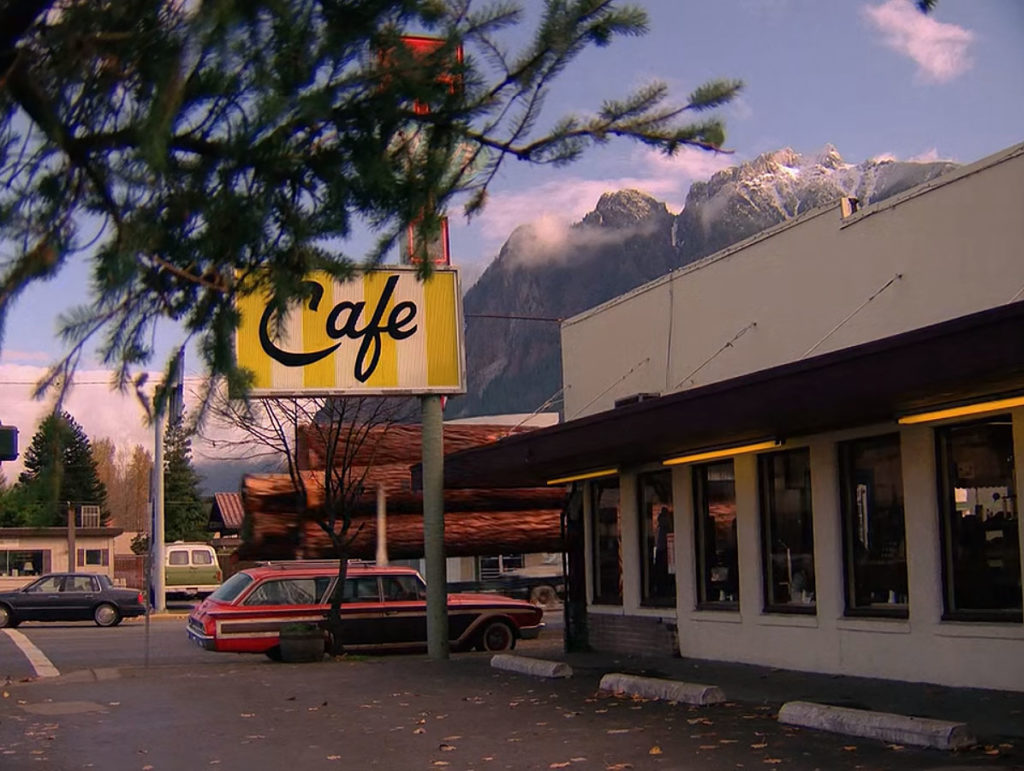 Exterior of Double R Diner with mountain in distance
