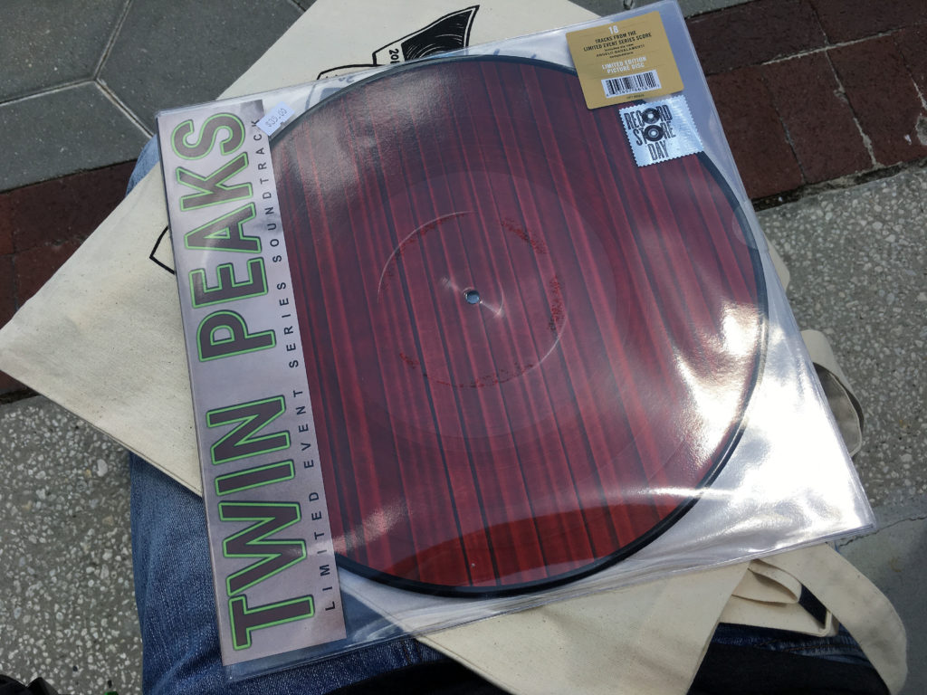 Twin Peaks Vinyl soundtrack with red room curtains on front of the record