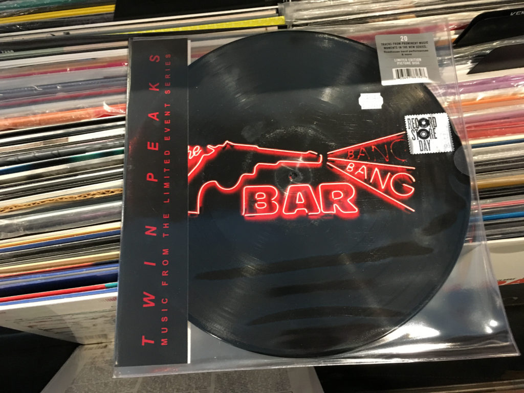 Twin Peaks Soundtrack - Bang Bang Bar picture disc laying on top of other records