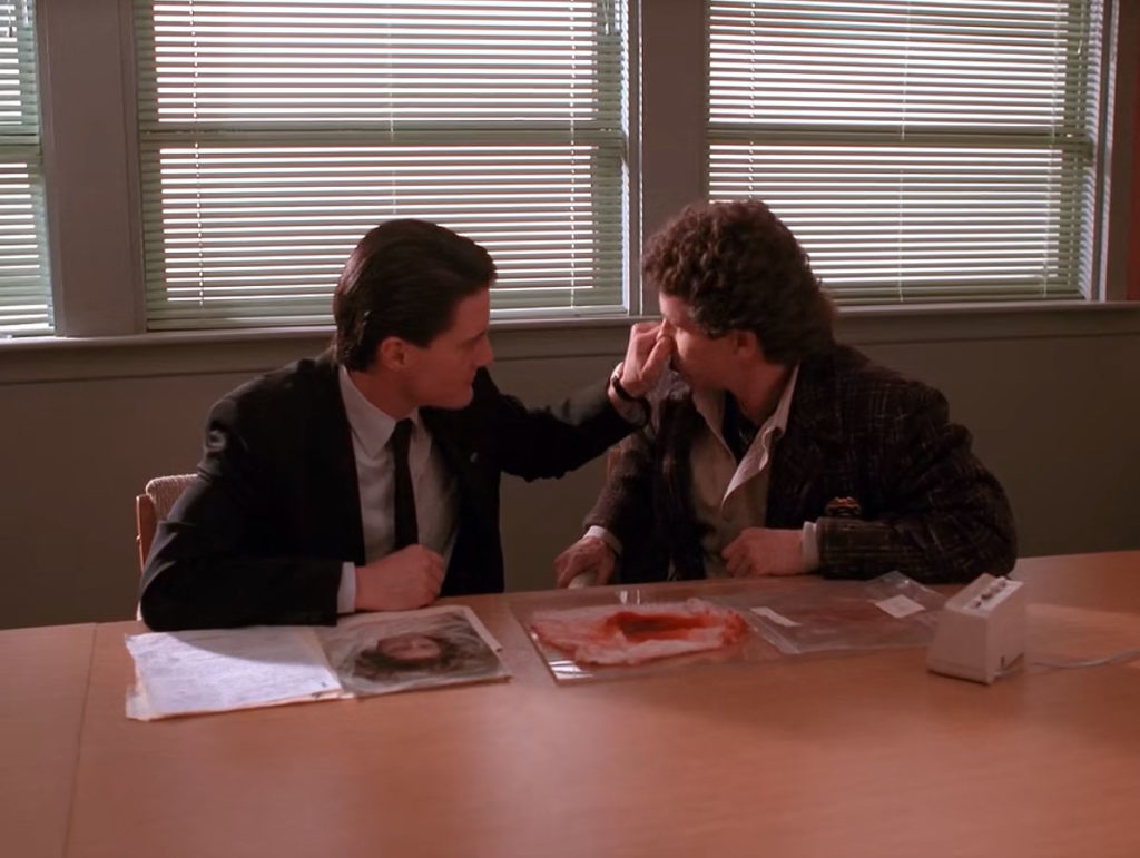 Agent Cooper Grabs Sheriff Truman's nose at the Twin Peaks Sheriff's Department