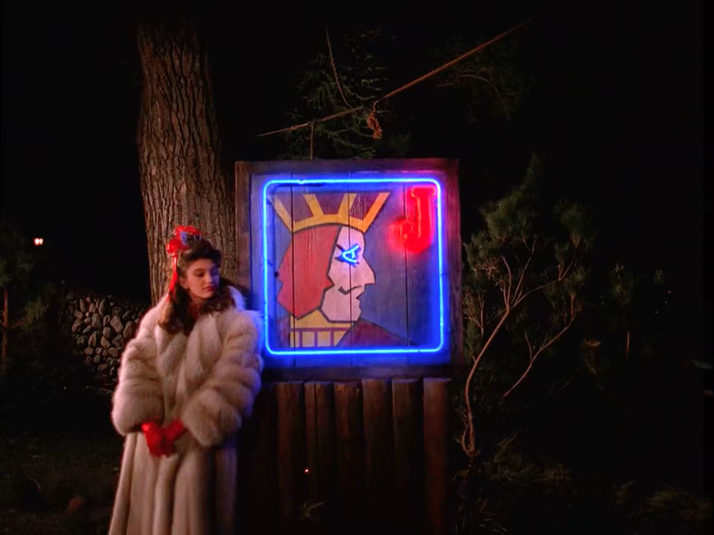 Girl in Fur Coat waiting near neon One Eyed Jacks