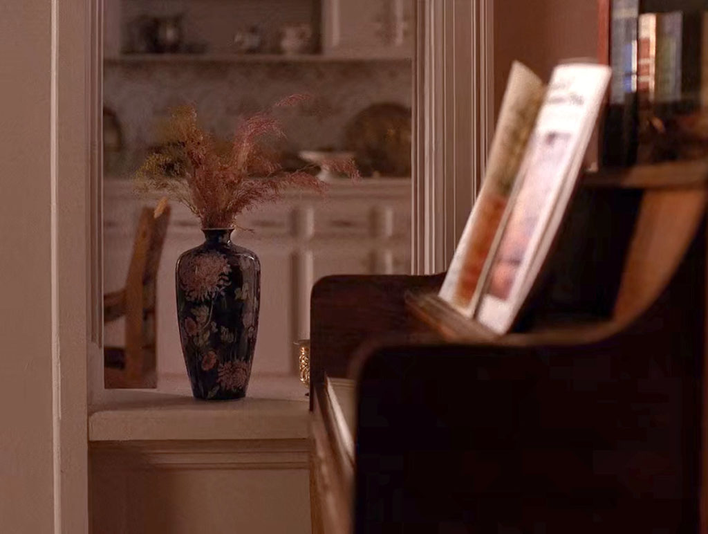 Piano and vase inside the Hayward house