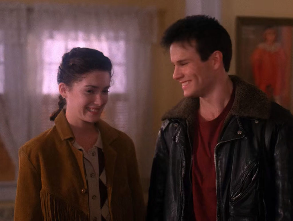 Donna Hayward and James Hurley laughing in the living room