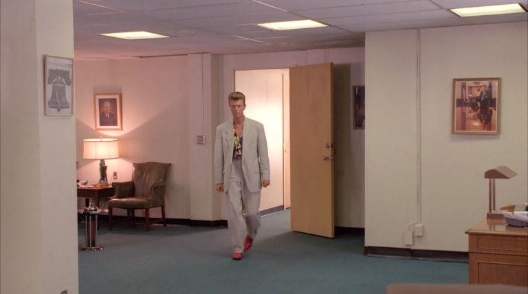 Agent Phillip Jeffries walking into a room