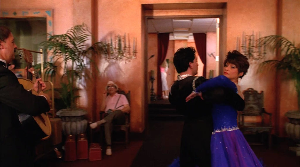 A couple dances through the hotel lobby in Twin Peaks - Fire Walk With Me