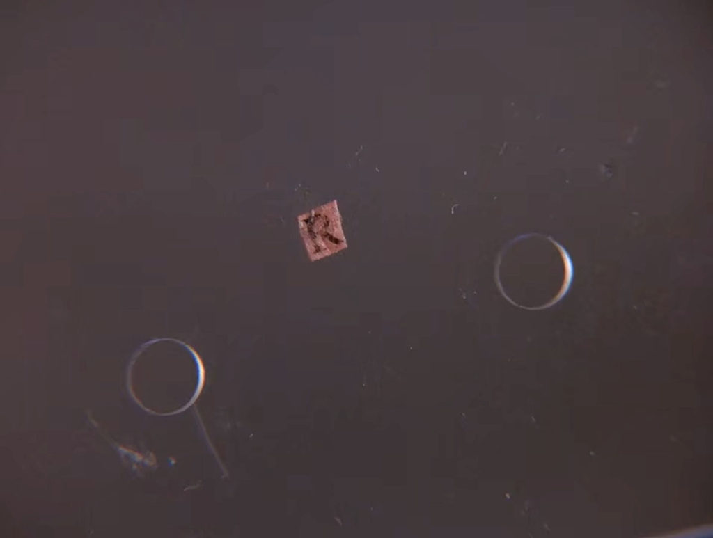 Letter R cut out of paper