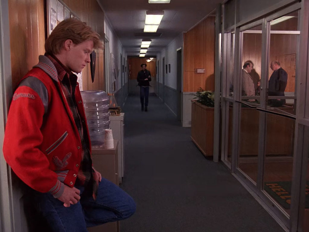 Mike Nelson waiting for Bobby Briggs by a water cooler in the Twin Peaks Sheriff's Station