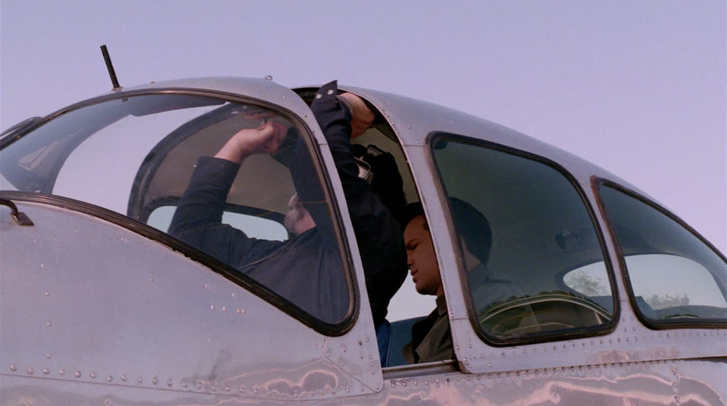 Close up of an airplane cockpit being opened