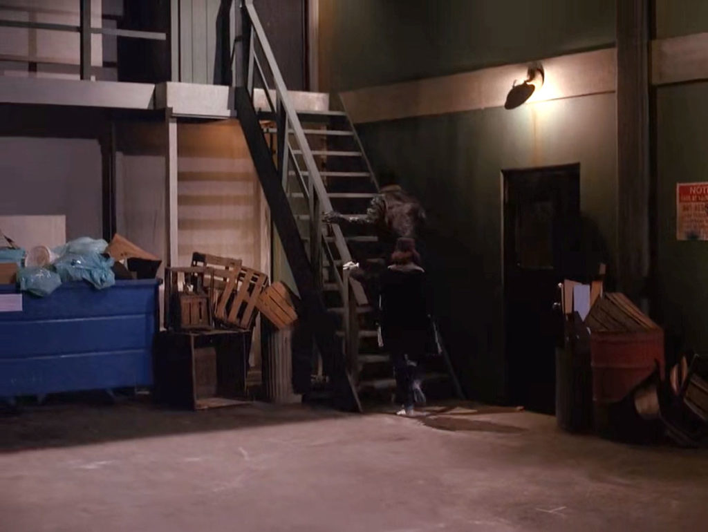 James Hurley and Donna Hayward climbing stairs