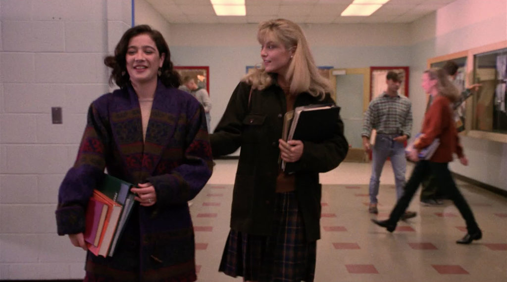 Donna and Laura in the school hallway