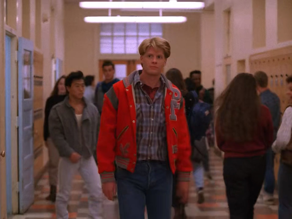 Mike Nelson wearing his TP Letterman Jacket in the hallway