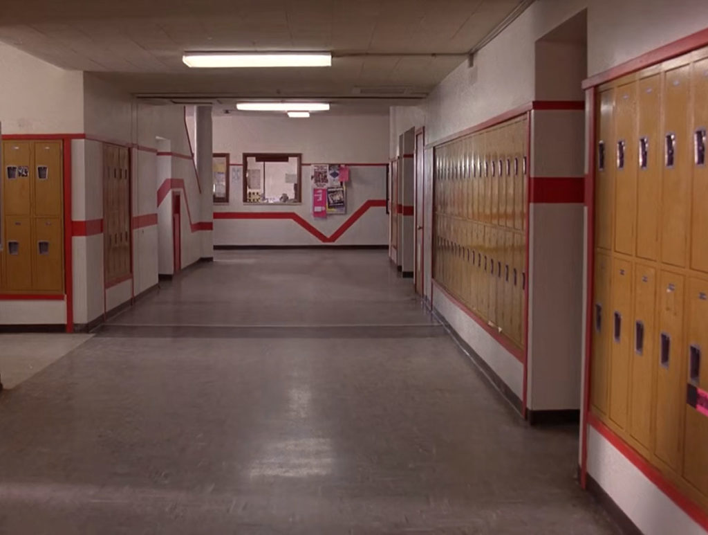 Hallway in Twin Peaks High School with Yellow Lockers and Red Stripes