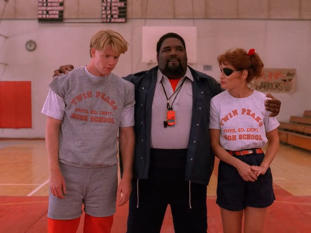 Mike Nelson, Coach Wingate and Nadine Butler Hurley in gym