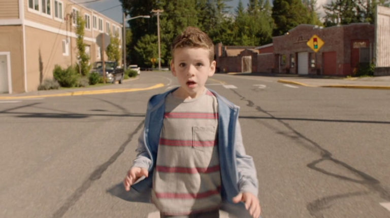 Boy standing in intersection