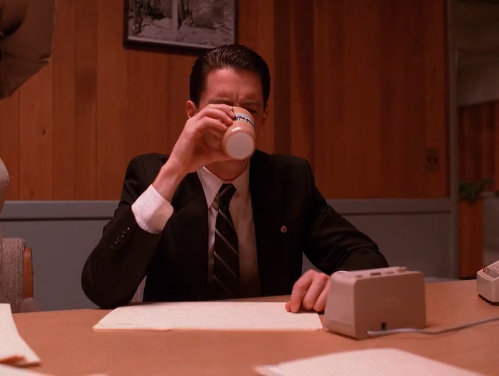 Special Agent Dale Cooper drinking coffee at the Twin Peaks Sheriff's Department