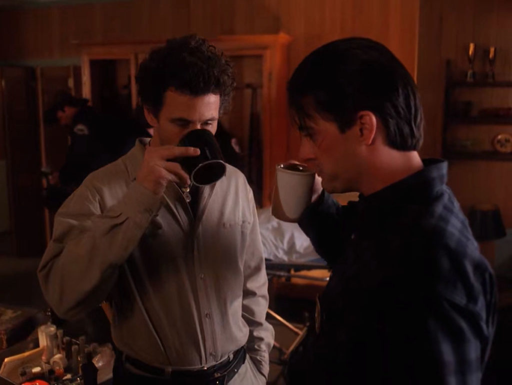 Sheriff Truman and Deputy Dale Cooper drinking coffee