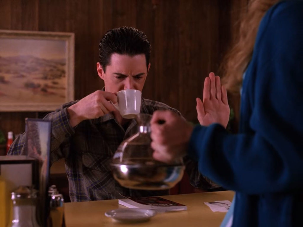 Deputy Dale Cooper drinks coffee at the Double R Diner 