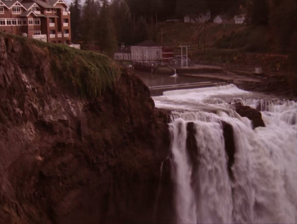 Top of White Tail Falls and corner of The Great Northern Hotel
