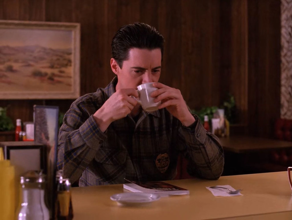 Deputy Dale Cooper drinks coffee at the Double R Diner 