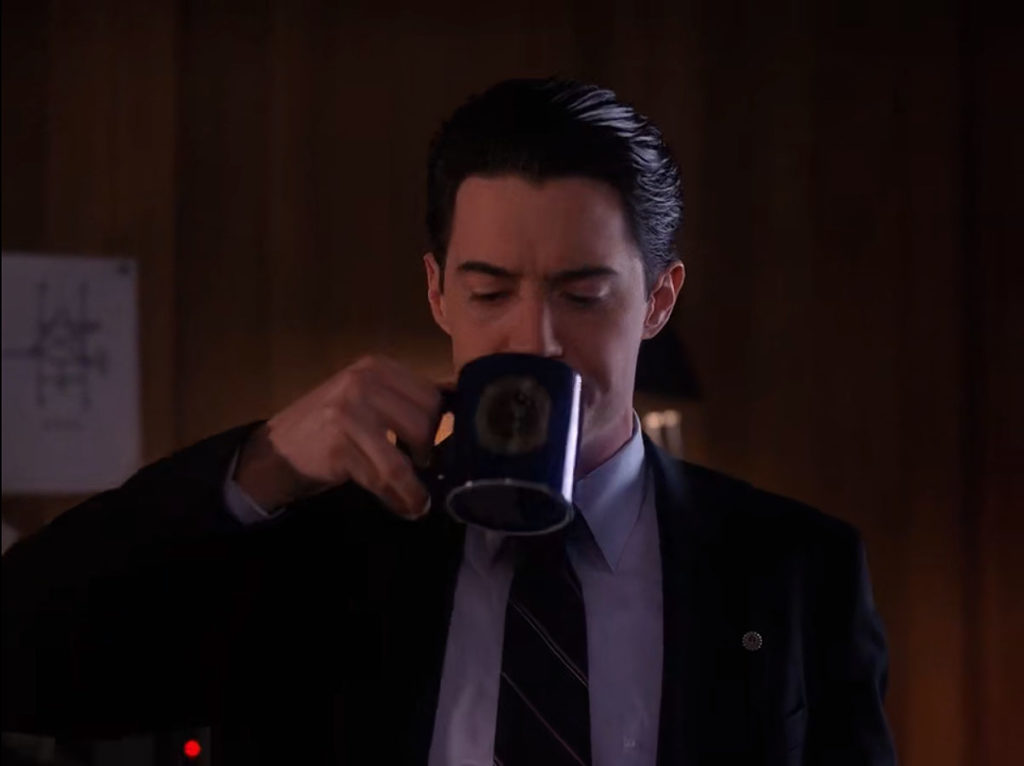 Special Agent Dale Cooper drinking coffee at the Twin Peaks Sheriff's Department