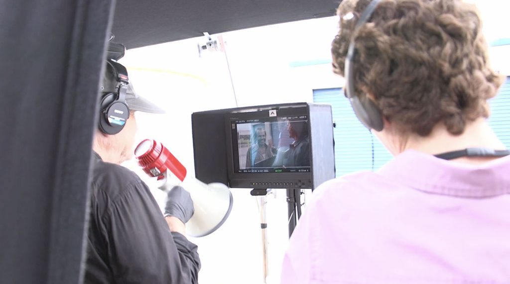 David Lynch and Sabrina Sutherland watching a monitor