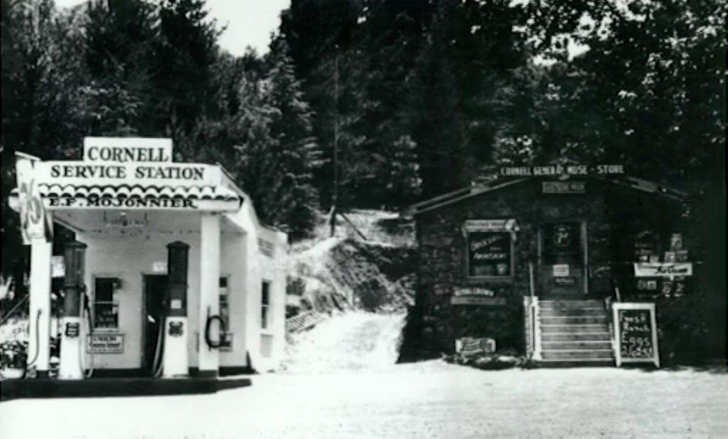 Black and white image of Cornell Service Station and The Rock Store