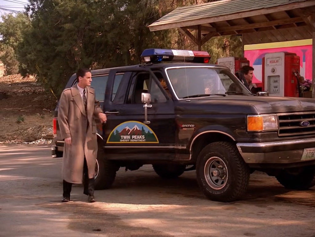 Agent Cooper exiting Ford Bronco at gas station