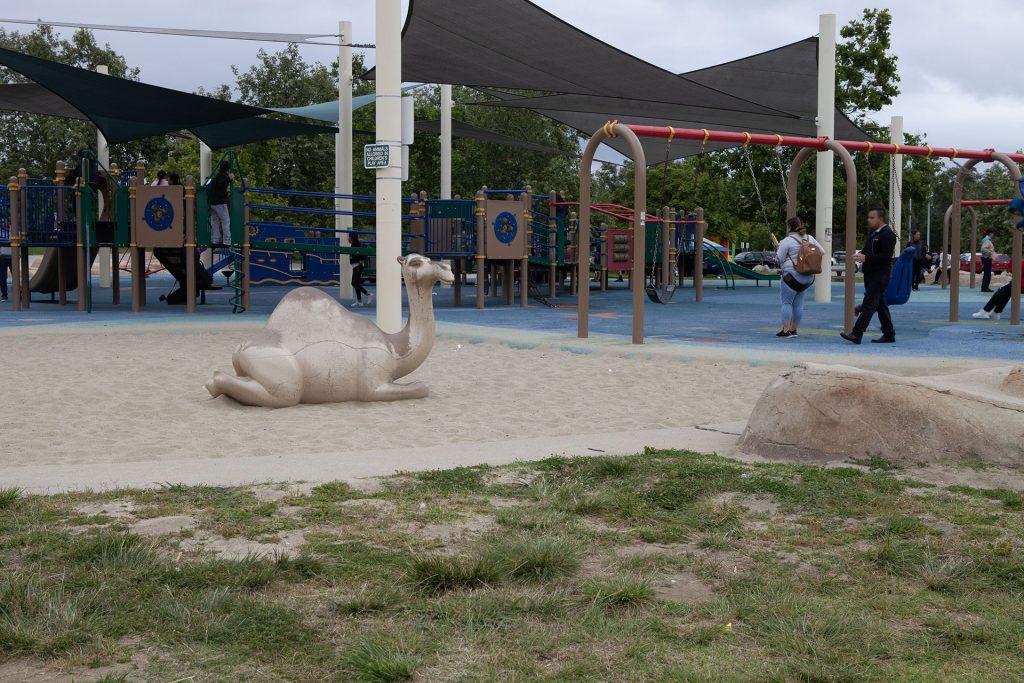 Park with playground equipment and sand