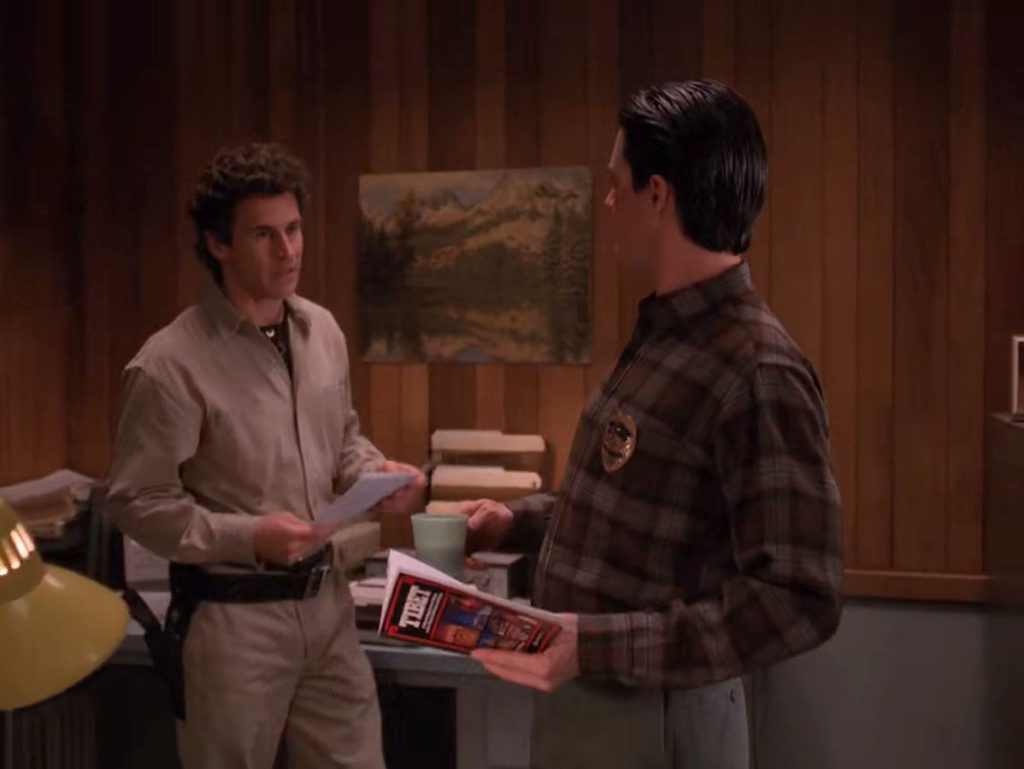 Dale Cooper speaking with Sheriff Truman