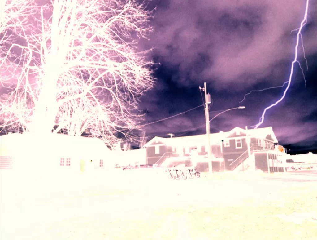 Negative image of Lighting strikes above the Roadhouse