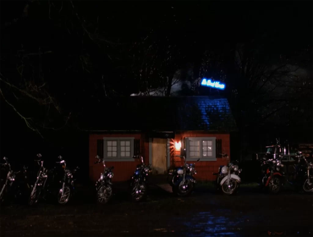 Exterior of Bookhouse with motorcycles parked out front