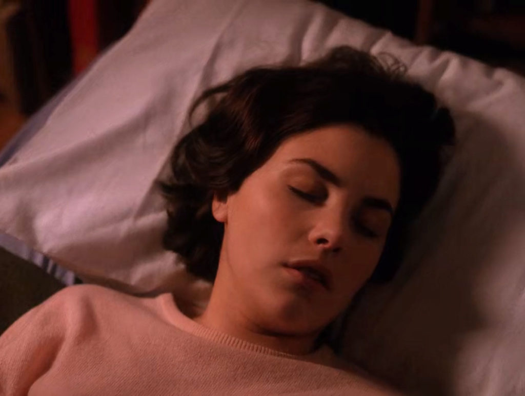 Audrey Horne lying in bed