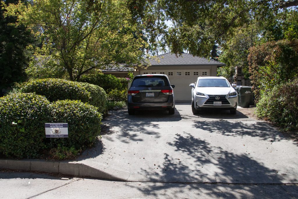 Home with two cars parked in driveway