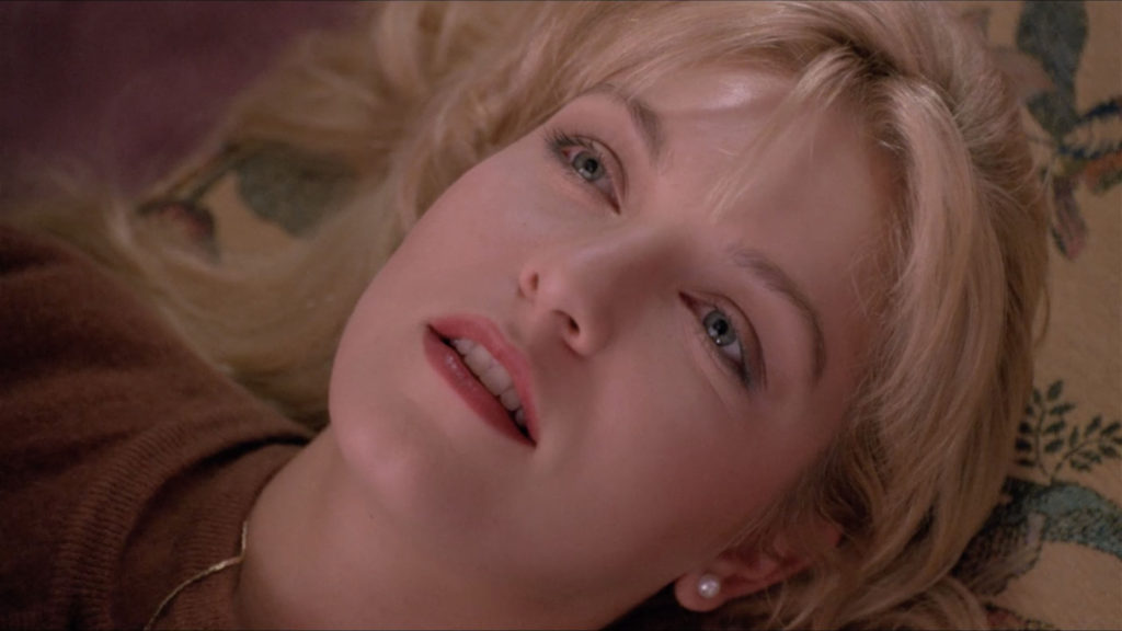 Laura Palmer laying on the chair at the Hayward's House