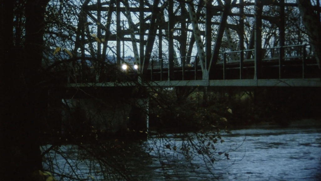 Missing Piece - Atmospheric Scene - Sheriff's Vehicle on Bridge