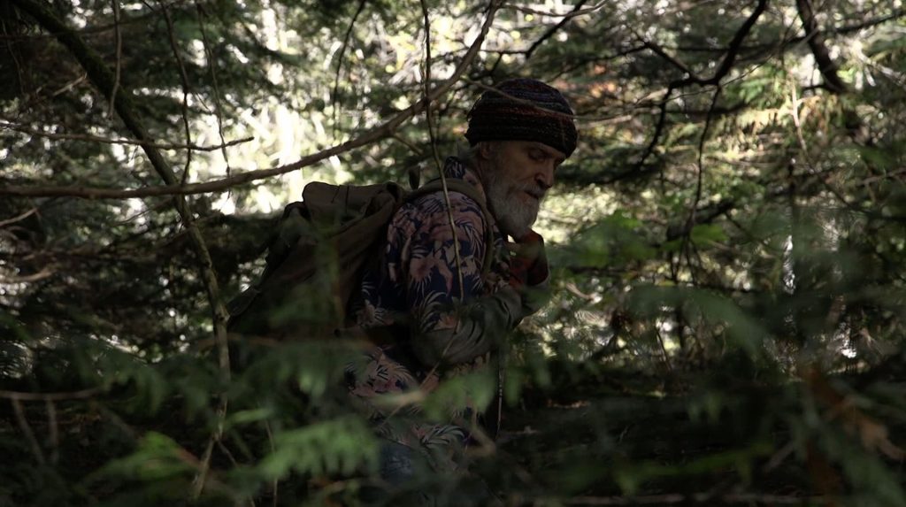 David Patrick Kelly in the woods