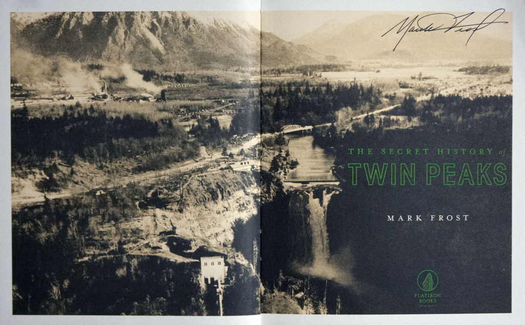 Secret History of Twin Peaks inside title page with black and white image of Snoqualmie Falls and Snoqualmie Valley with autograph by Mark Frost