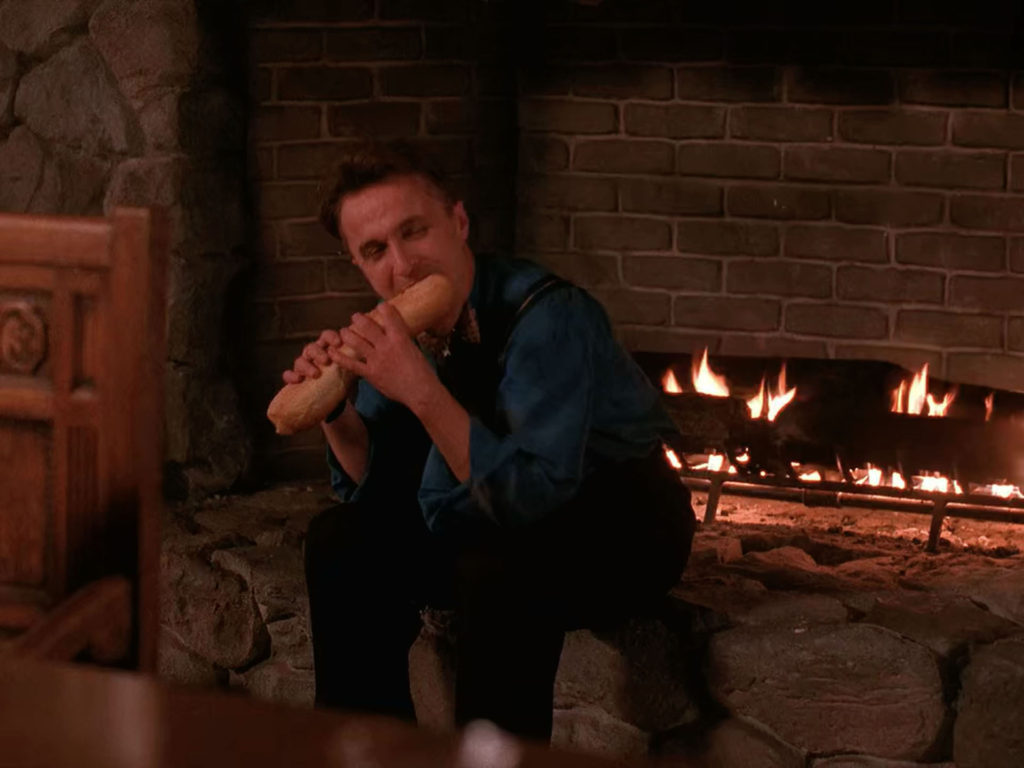 Jerry Horne eating a baguette