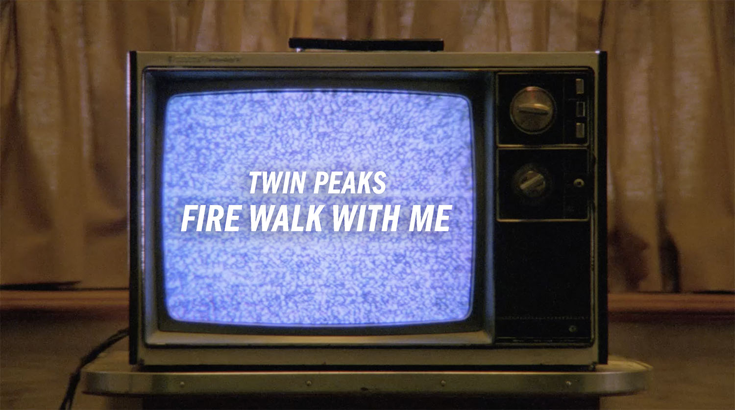 Television on a stand with "Twin Peaks: Fire Walk With Me" on snow-filled screen