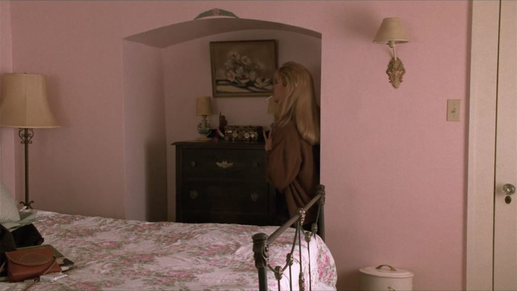 Laura Palmer next to the dresser in her Bedroom