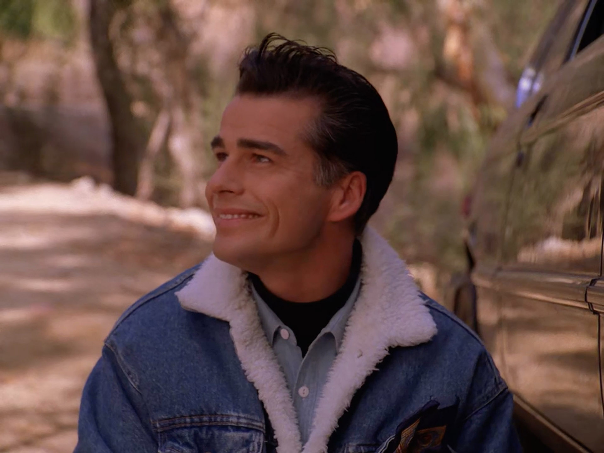 Dick Tremayne wearing a fur-lined jean jacket
