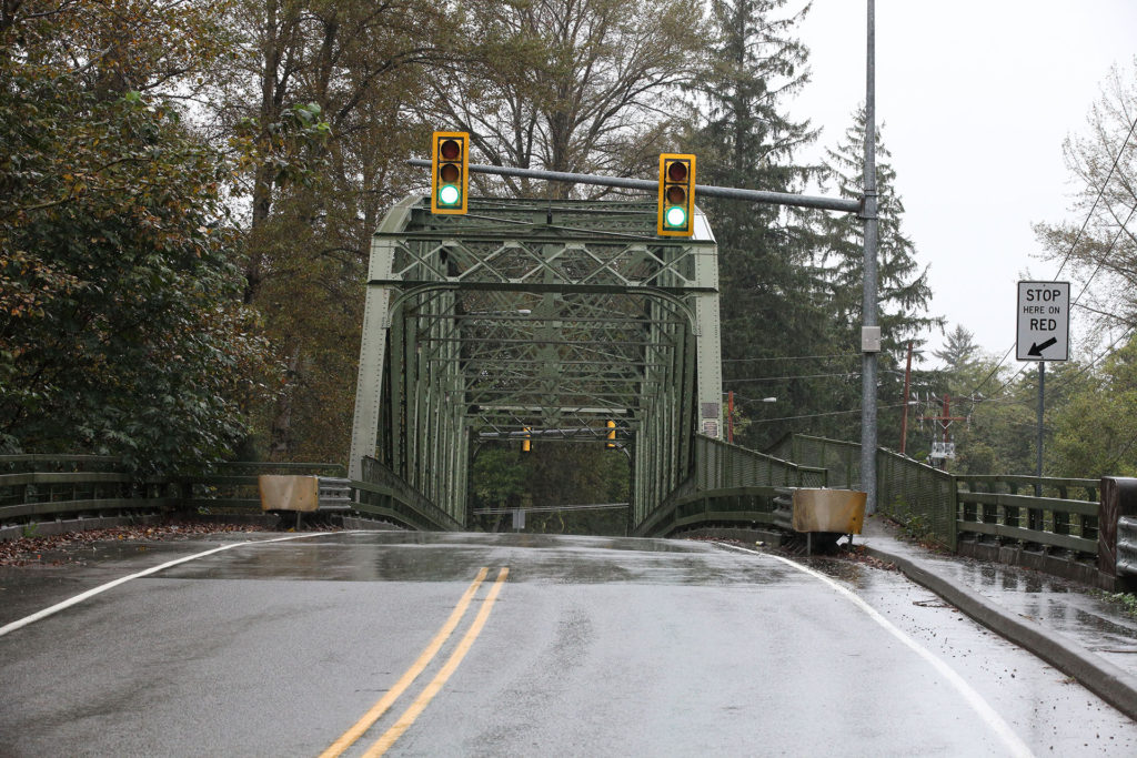 Meadowbrook Bridge with a green light