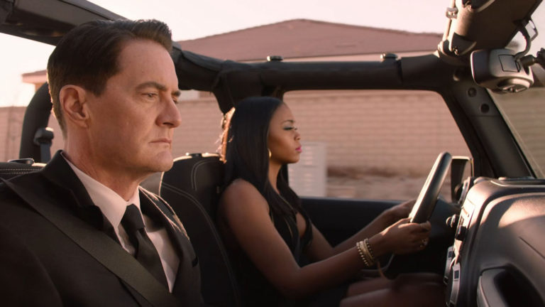 Dougie Jones and Jade in a Jeep