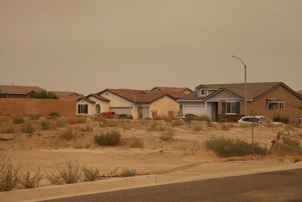 Dirt land and houses