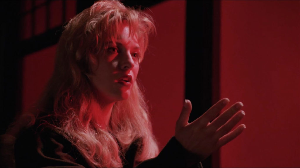 Laura Palmer with her hand extended