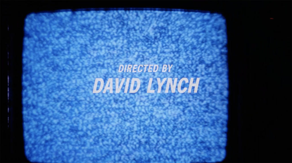 Image of television screen with blue-hued snow and the words "Directed by David Lynch"