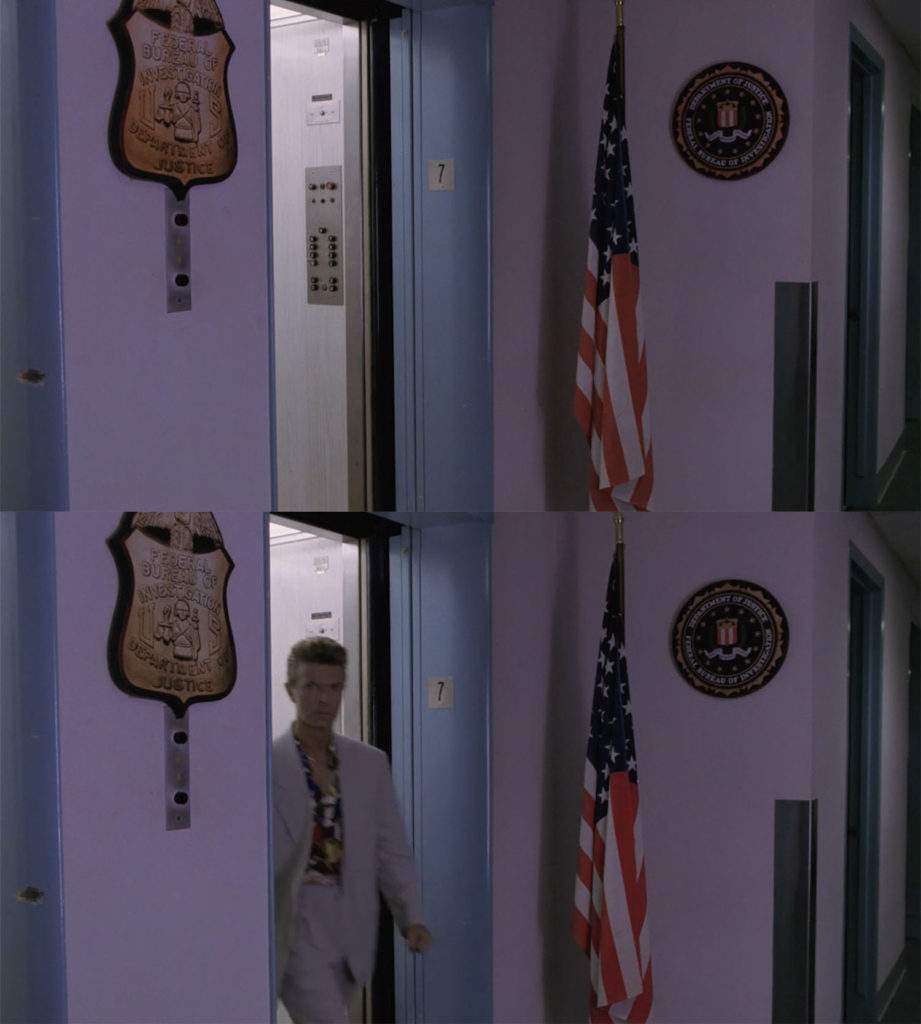 Open elevator door at the FBI office in Philadelphia and Agent Phillip Jeffries (David Bowie) exiting the elevator door