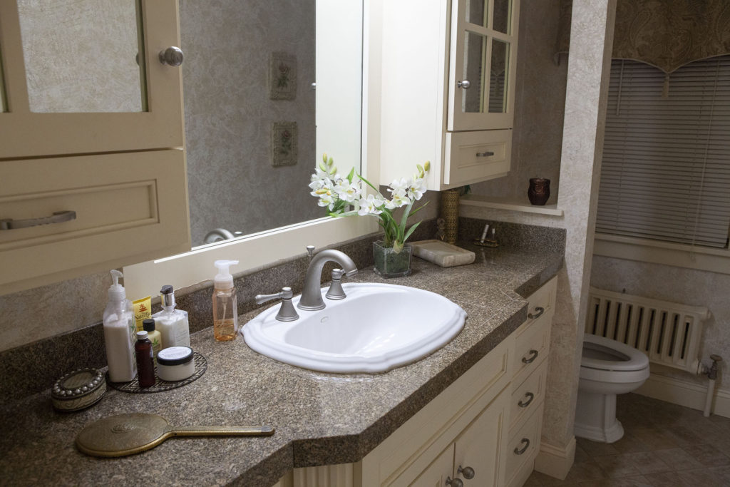Bathroom with white sink and mirror