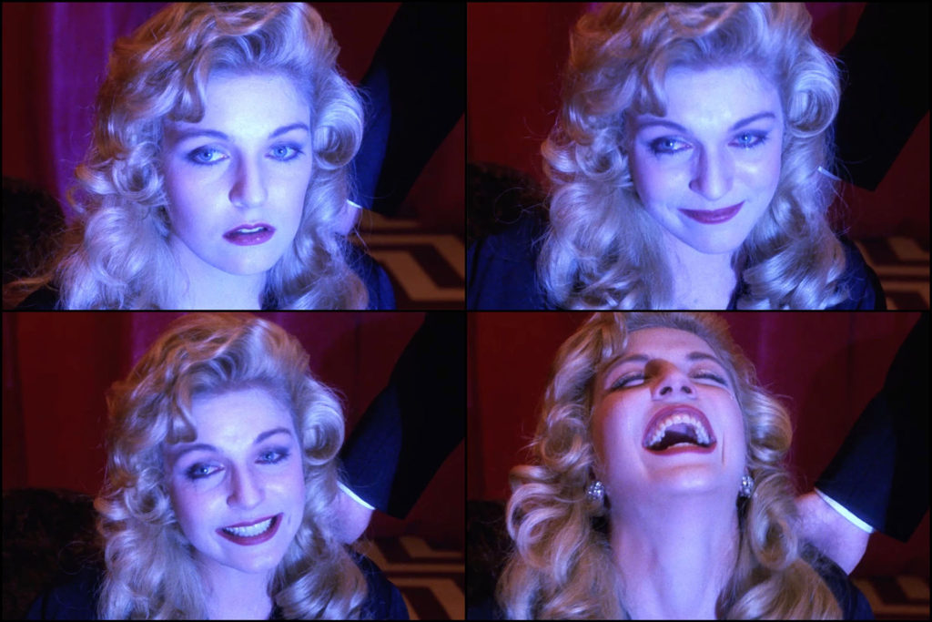 Laura Palmer (Sheryl Lee) in the Red Room laughing and crying upon seeing her angel