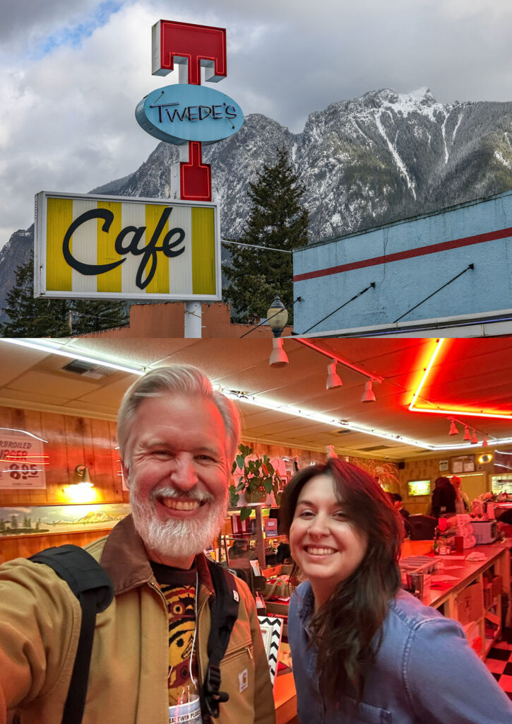 Twede's Cafe sign with a giant red T and a snow-covered Mount Si in the distance.